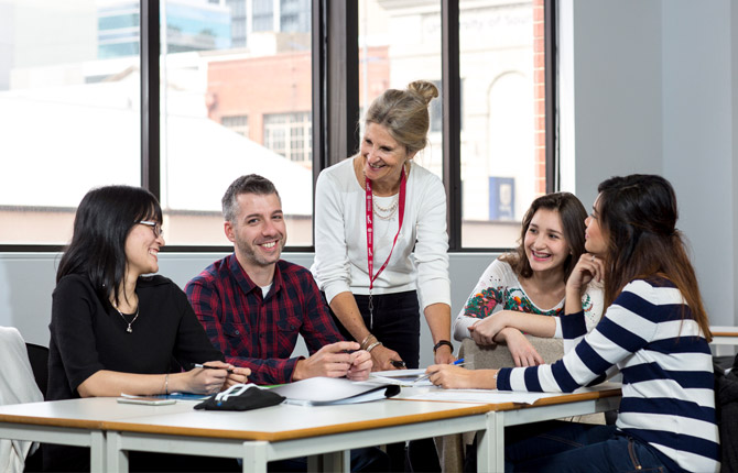 International students in a classroom learning English